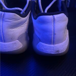 Jordan White and Black Athletic Shoes with Padded Silhouette